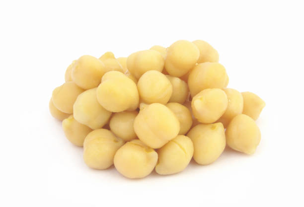 istock Heap of chick peas isolated on white 1311646424
