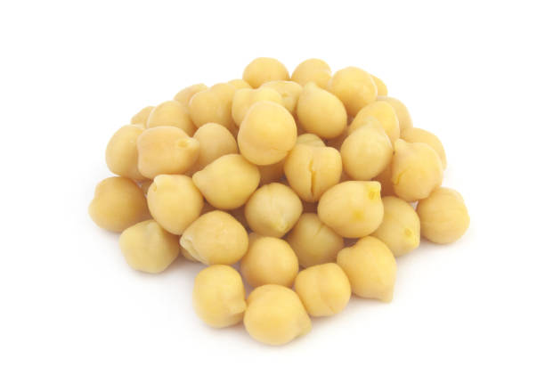 istock Heap of chick peas isolated on white 1311646983
