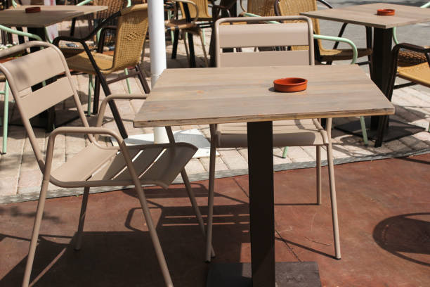 istock empty tables in a street restaurant 1311647371