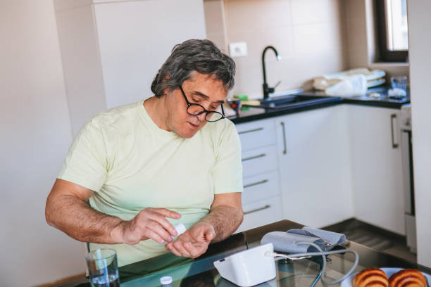 istock Senior man- preparation checking blood pressure 1311647414