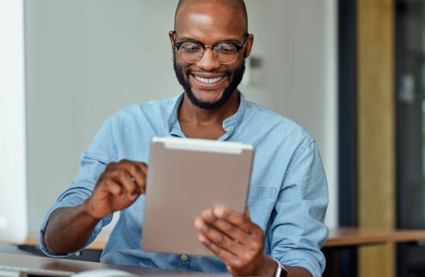 istock Browsing for fresh office furniture 1311647598
