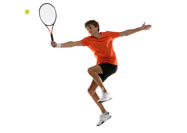istock Young Caucasian man, tennis player training isolated on white background. 1311649969