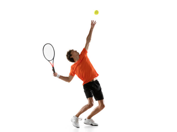 istock Young Caucasian man, tennis player posing isolated on white background. 1311649975