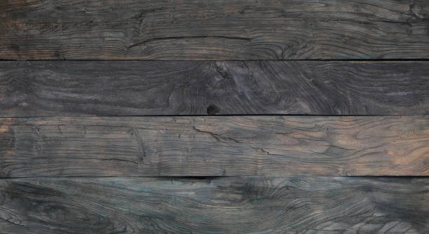 istock old halloween black wood background 1311650015