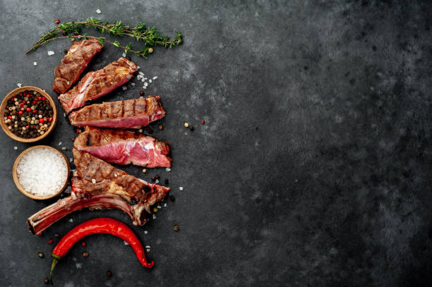 istock grilled beef steak - tomahawk on a stone background. with copy space for your text 1311651510