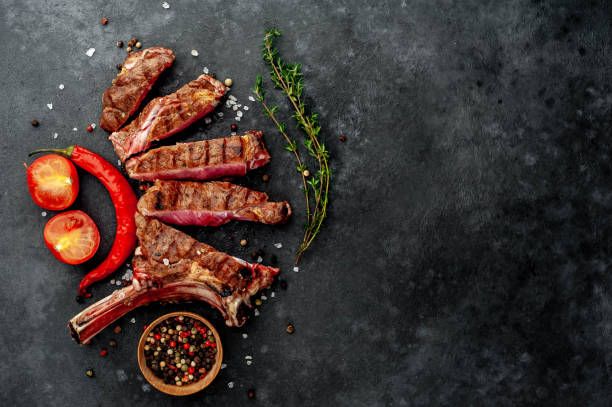 istock grilled beef steak - tomahawk on a stone background. with copy space for your text 1311651610