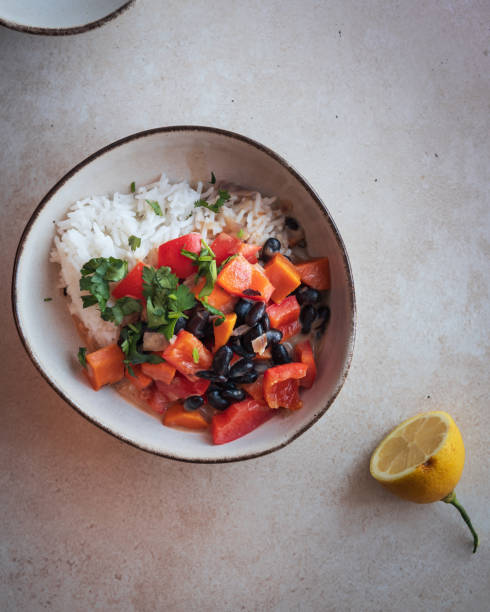istock Vegan Bowl Vegetables Rice Coconut Almond Sauce 1311659804