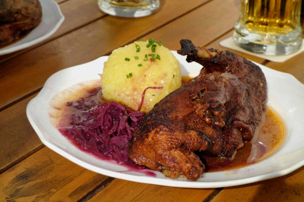 istock Roasted goose in a beer garden, Bavaria, Germany 1311660269