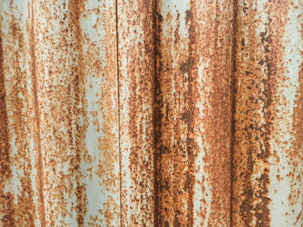 Texture of old rusty wavy metal sheet