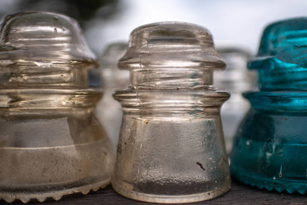 Closeup of collected and coloured transmission line insulators