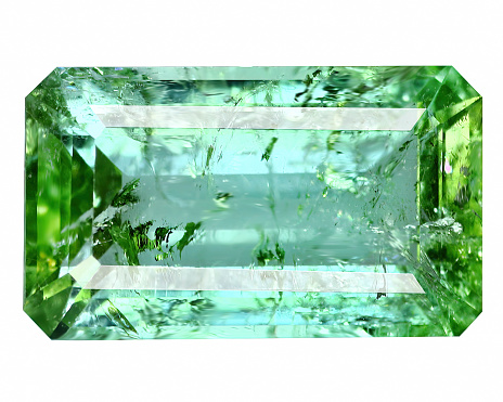 Natural gemstone green tourmaline on white background