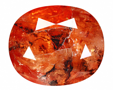 Natural gemstone orange triplite on white background
