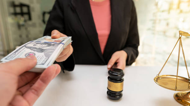 istock The lawyer was offered a money idea. Corruption, corruption 1311663887