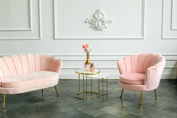 istock beautiful classical white interior with a sofa and a coffee table. Retro, classics. Luxury white interior 1311664807