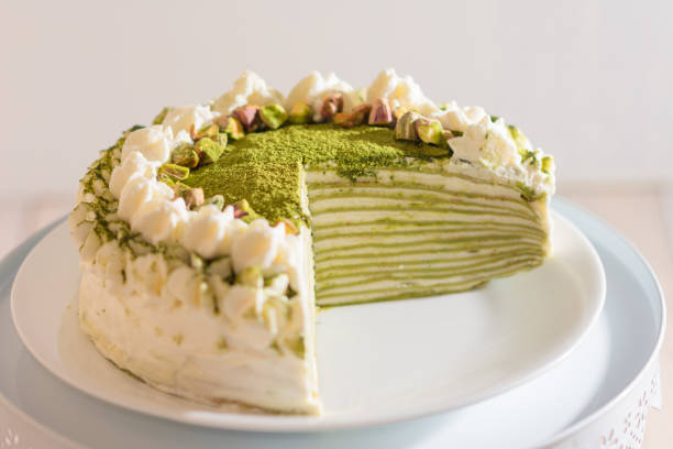 Matcha Mille Crepe Cake Matcha Mille Crepe Cake. Image can be utilized editorially or commercially. wedding cake close up macro stock pictures, royalty-free photos & images