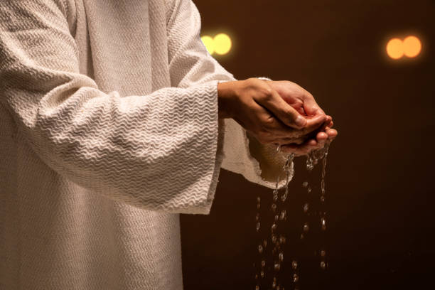 istock Jesus Christ praying and reading the Holy Bible 1311671893