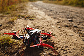 The handmade race drone in the forest road