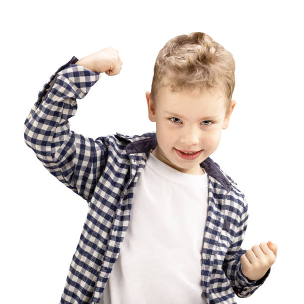 istock little boy showing his hand biceps muscles strength isolated on white background 1311678696