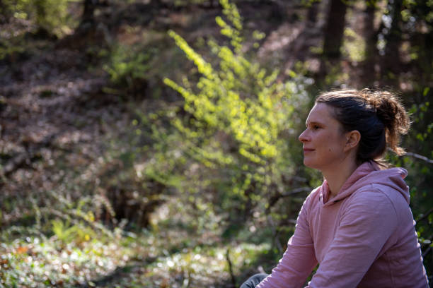 istock Woman doing stretching in the Forest 1311679559