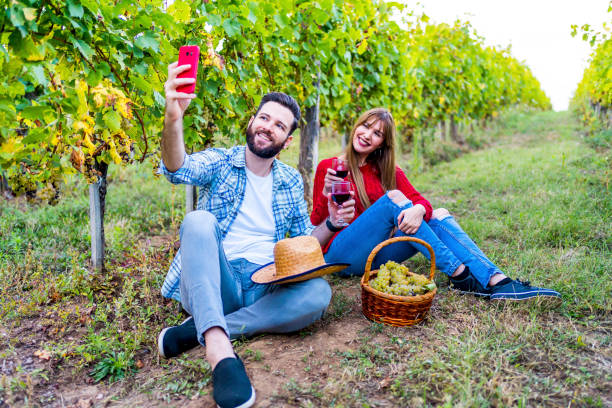 istock Couple enjoying in vineyard 1311681172