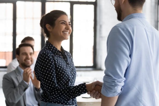 istock Glad woman corporate worker of indian ethnicity getting recognition 1311682046
