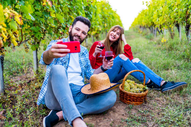 istock Couple enjoying in vineyard 1311682064