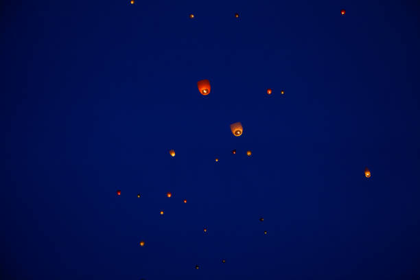 The Chinese lantern flies up highly in the sky.