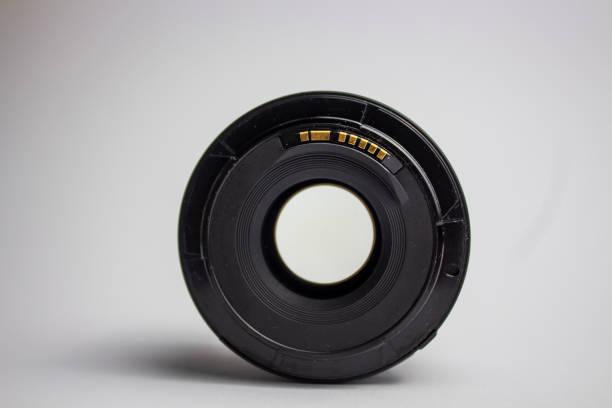 istock Photographic lens. broken or broken. Modern lenses with reflections. Modern lens. Lens. on a white background. space for text 1311683489