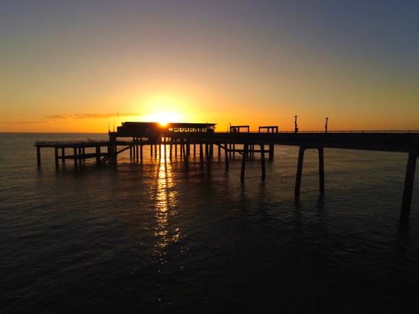 istock Deal Pier at sunrise 1311686664