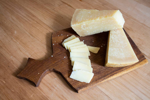 istock Cheese on a wooden board. View from above. copy space 1311686868