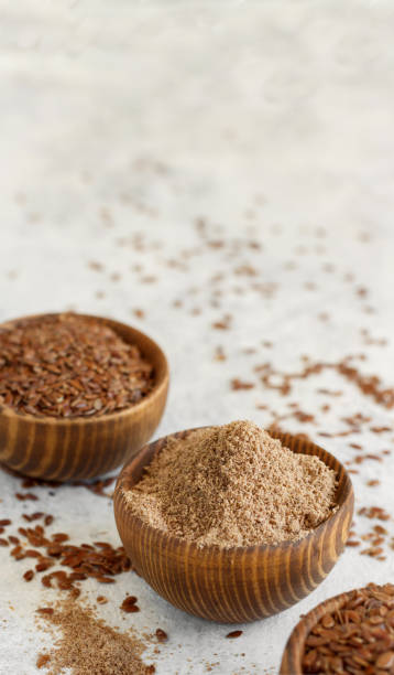 istock Raw Flax seeds flour and seeds in bowls 1311687061