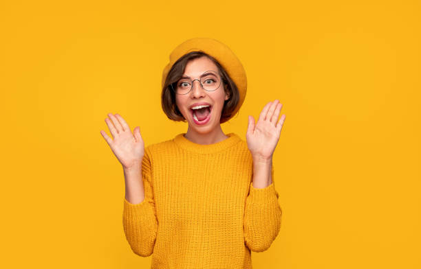 istock Excited woman in beret screaming 1311688055