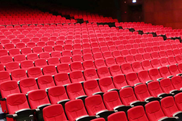 istock Cinema empty auditorium with red seats 1311688216