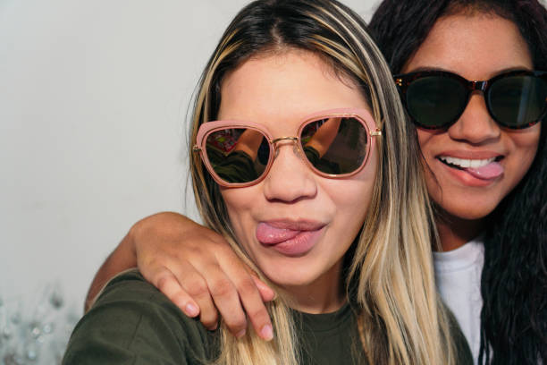 istock Multi-ethnic friends with sunglasses taking a selfie 1311690194