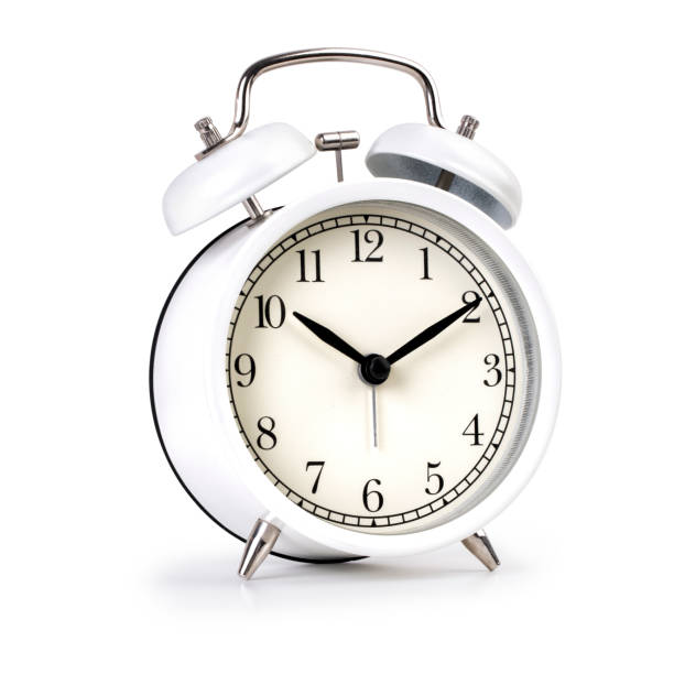 istock Classic white alarm clock isolated on white background 1311695584