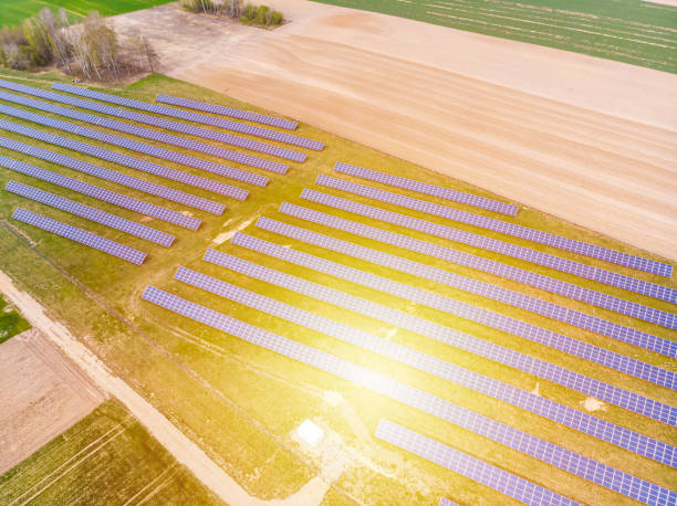 istock Solar panels small farm aerial view 1311696354