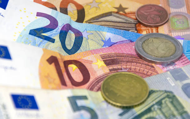 istock European Union coins and banknotes of different values 1311700183