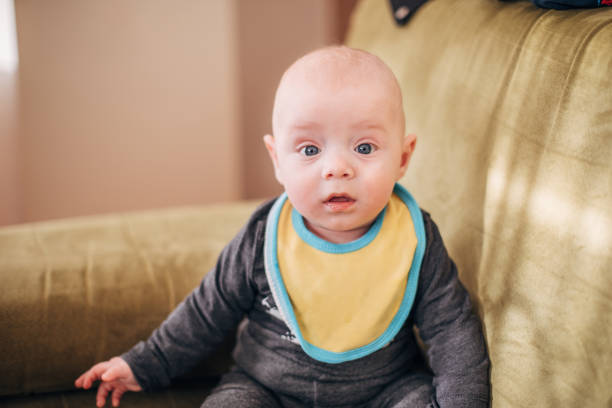istock Blue eyed baby boy looking to camera 1311707775