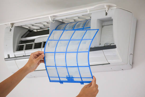 istock man hand hold air conditioner filter cleaning concept 1311711946