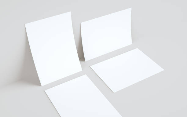 istock A4 Flyer / Letterhead Mock-Up - Two Flyers Against Wall Background 1311712398