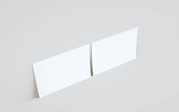 istock A5 Flyer / Brochure Mock-Up - Two Flyers Against Wall Background 1311712402