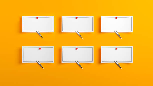 istock Black framed White-colored square empty speech bubbles and red-colored pins On yellow-colored background 1311726908