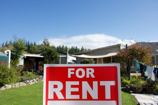 istock For Rent Sign Outside House 1311737009