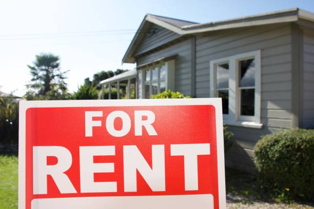 istock For Rent Sign Outside House 1311737590