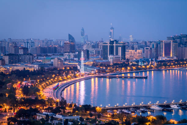Baku city at dusk. Baku city, Azerbaijan, view of the modern skyline on the Caspian sea coast. baku stock pictures, royalty-free photos & images