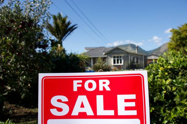 istock For Sale Sign Outside House 1311739255