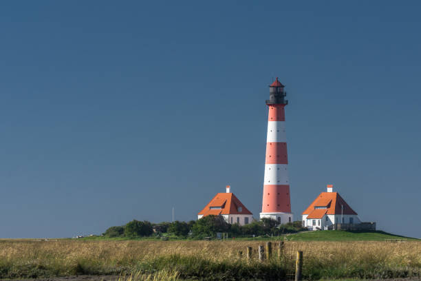 istock Lighthouse Westerheversand, Westerhever, Eiderstedt, North Frisia, Schleswig-Holstein, Germany 1311740157