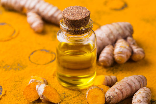 istock Turmeric essential oil, orange root and powder, beauty and spa 1311741205