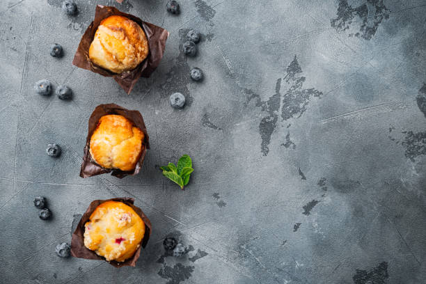 istock Muffin with blueberries, on gray background, top view flat lay with copy space for text 1311743999