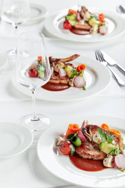 istock Steak on the bone. tomahawk steak On a white background. Top view. Free copy space 1311745036